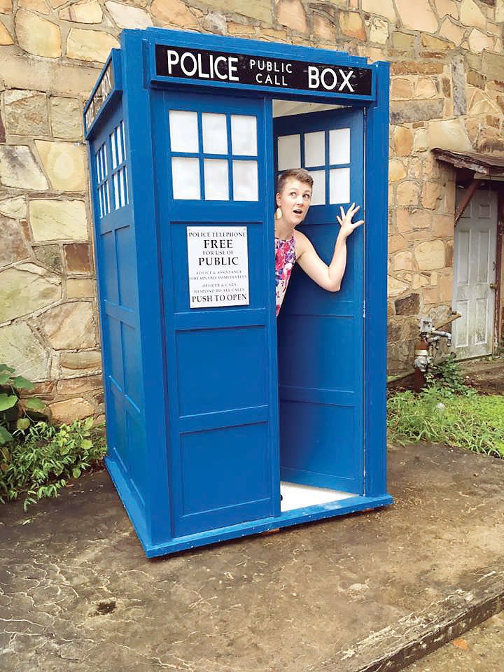 Jenny Dunham of Clinton poses in the replica of the Doctor Who TARDIS machine, which was constructed by Charles Wilson, the city’s street foreman, and his daughter, Jancey. The idea came from Jason Hayes, executive director of the Clinton Area Chamber of Commerce, who said the prop will include information about chamber businesses and events in the city. It will be moved to different locations “to showcase members that might not get easily noticed otherwise,” he said.