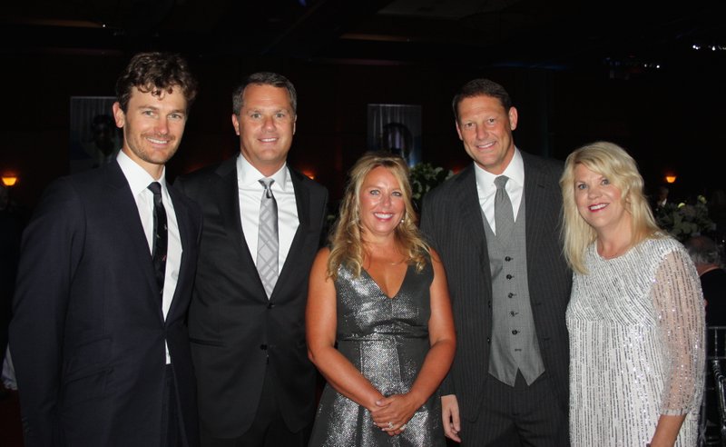 Steuart Walton, Color of Hope keynote speaker (from left), Doug and Shelley McMillon and Charles and Sue Redfield, gala chairmen, gather at the Arkansas Children’s Hospital benefit Aug. 4 at the John Q. Hammons Center in Rogers.