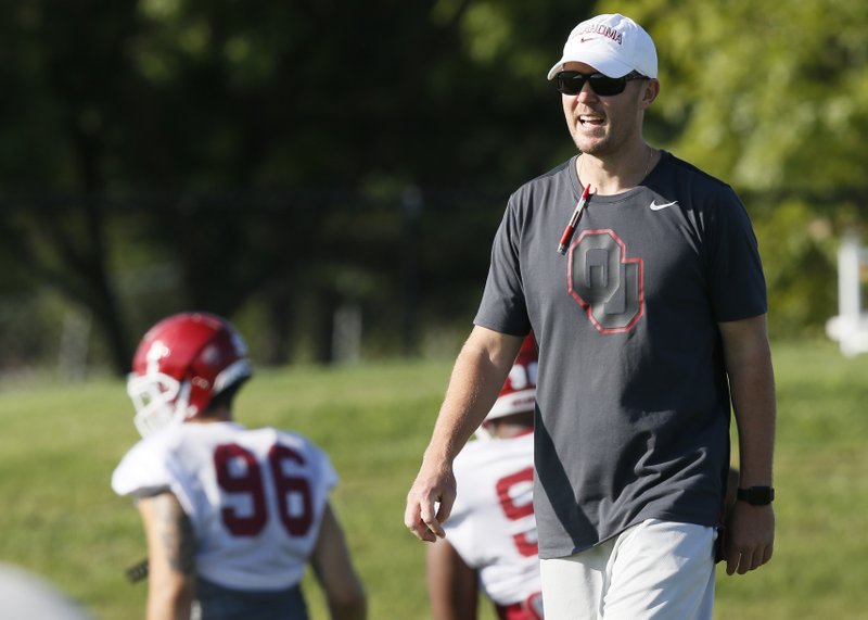 Oklahoma head coach Lincoln Riley watches during an NCAA college football practice in Norman, Okla., Thursday, Aug. 17, 2017. 