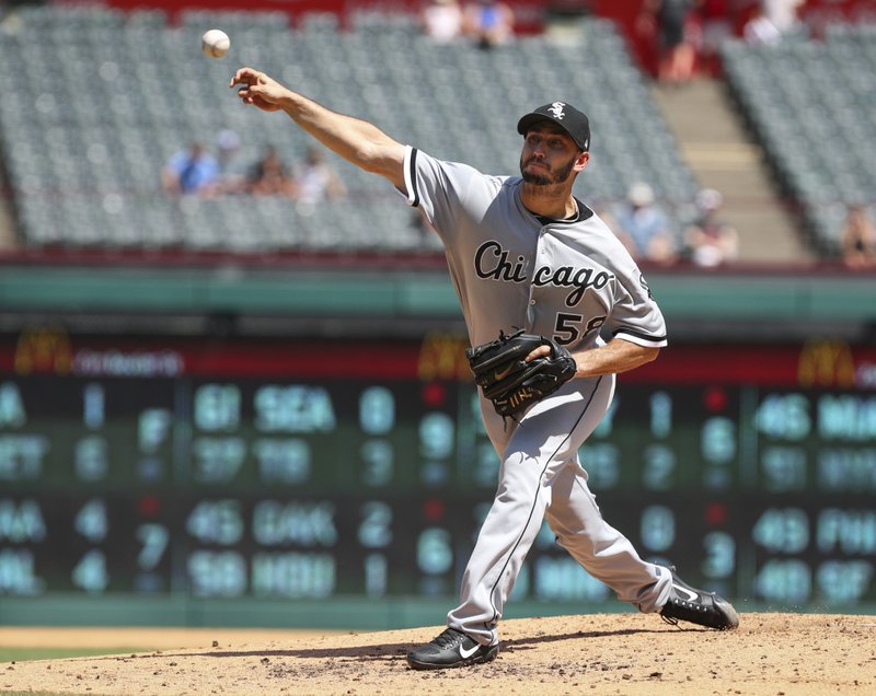 The Associated Press HOT PITCHING: Chicago White Sox starting pitcher Miguel Gonzalez (58) delivers a pitch in the second inning against the Texas Rangers at Globe Life Park in Arlington, Texas, Sunday.