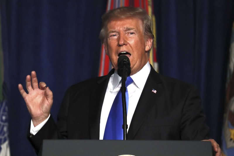 President Donald Trump speaks at Fort Myer in Arlington Va., Monday, Aug. 21, 2017, during a Presidential Address to the Nation about a strategy he believes will best position the U.S. to eventually declare victory in Afghanistan. (AP Photo/Carolyn Kaster)
