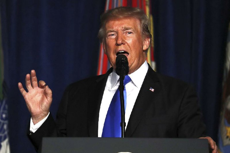 President Donald Trump speaks at a base in Arlington, Va., on Monday during a presidential address to the nation about a strategy he believes will best position the U.S. to eventually declare victory in Afghanistan.
