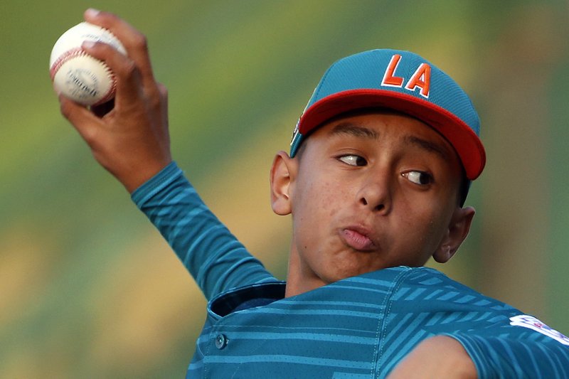 Maracaibo, Venezuela pitcher Dario Acurero delivers in the second inning of an International elimination baseball game against Santiago, Dominican Republic at the Little League World Series tournament in South Williamsport, Pa., Monday, Aug. 21, 2017. 