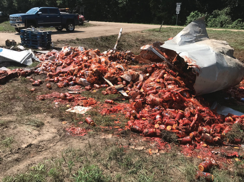 A truck spilled spaghetti sauce in a crash in Camden early Monday morning. (Photo by Camden News)
