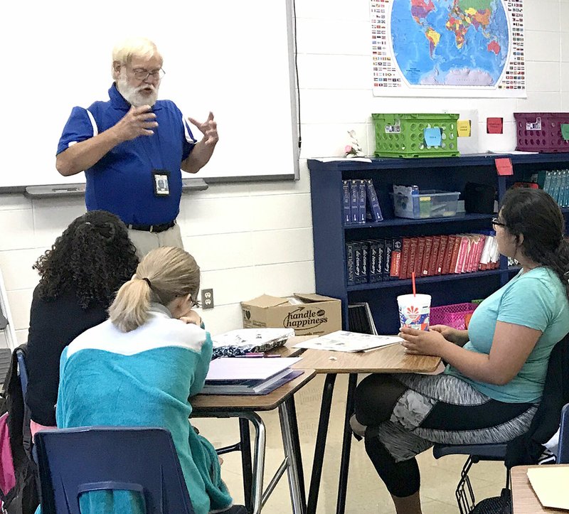 Submitted Photo Mike Eckels, Decatur reporter for the Westside Eagle Observer, talked to a group of students from Jennifer Longstreth&#8217;s media class about his experiences as a journalist Aug. 16 at Decatur High School.