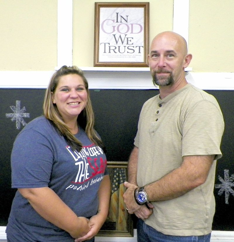 Photo by Larry Burge Sulphur Springs&#8217; mayor, Shane Weber (right), congratulated Codi Bates on her new job as the town&#8217;s city clerk on Thursday.