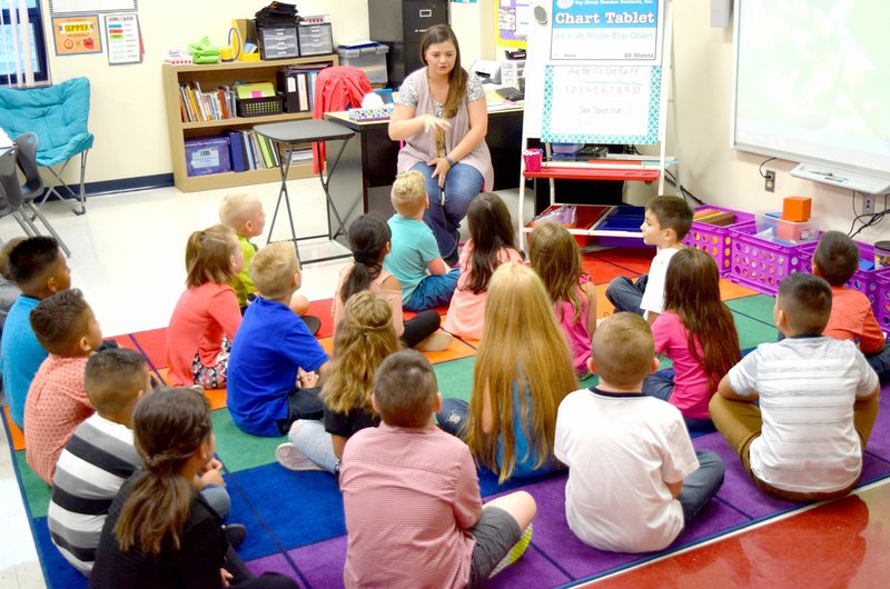 Ashley Lee talked to her new second grade students about her rules of conduct during the opening day of classes at Northside Elementary in Decatur Aug. 14.