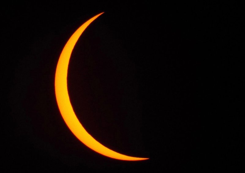 The partial solar eclipse on Monday, Aug. 21, 2017, could be viewed in Northwest Arkansas for about three hours, from about 11:40 a.m. until 2:40 p.m. The maximum eclipse was near 1:15 p.m., with about 90 percent of the sun blocked from view by the moon. The accompanying photos were taken with a homemade filter constructed from the same safety glasses children used at the schools. One lens was cut from the glasses and attached to a cardboard disk placed over the camera lens to keep direct sunlight from entering the camera and possibly damaging the image sensor.