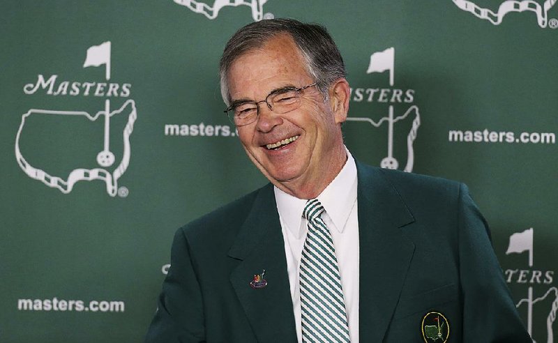 In this April 6, 2016 photo, Augusta National Chairman Billy Payne smiles during a news conference at the Masters golf tournament in Augusta, Ga. Payne announced Wednesday, Aug. 23, 2017, that he is retiring as chairman of the Augusta National Golf Club. 