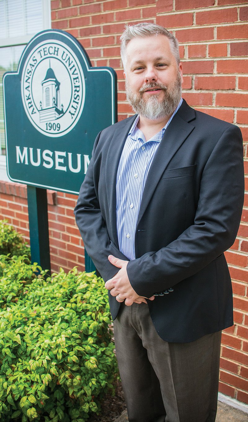 James Peck stands outside Arkansas Tech University’s museum in Russellville. Peck, who lives with his family in Pottsville, has been the executive director of several museums throughout the country. He was hired to head the Tech museum after longtime museum director Judith Stewart-Abernathy retired.