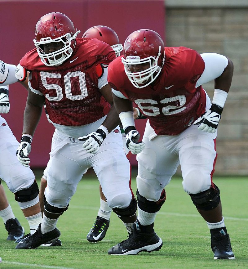 Arkansas junior offensive lineman Johnny Gibson (62), a former walk-on, was awarded a scholarship in 2016.