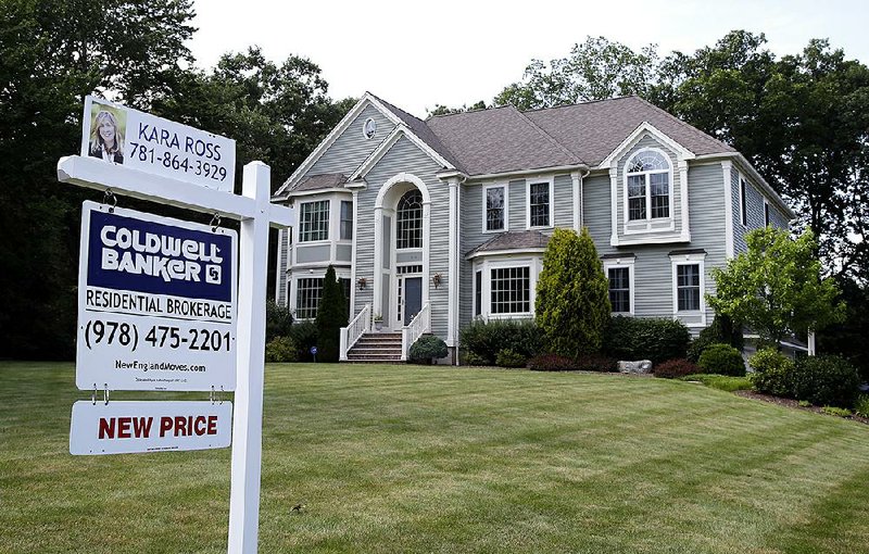 A house for sale in North Andover, Mass., on July 10 was one of the shrinking number of previously owned homes for sale in the U.S. That market segment has fallen 9 percent in the past 12 months.