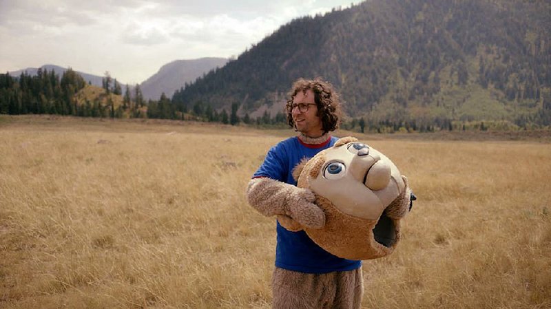 James (Kyle Mooney) is an adolescent 25-year-old who decides to film a movie about a favorite childhood hero in the gentle comedy Brigsby Bear.