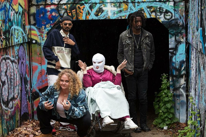 In Geremy Jasper’s uplifting underdog story Patti Cake$, PBNJ is the name of the rap group started by Patti (Danielle Macdonald), Jeri (Siddharth Dhananjay) and Basterd the Antichrist (Mamoudou Athie). That’s Patti’s grandmother (Cathy Moriarty) in the ski mask.