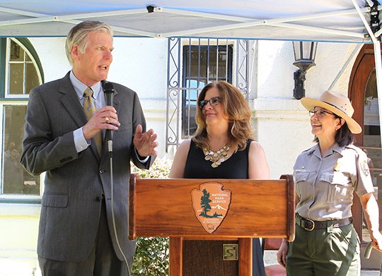 The Sentinel-Record/Richard Rasmussen REOPENING: Hot Springs Mayor Pat McCabe, left, his wife, Ellen McCabe, and Hot Springs National Park Superintendent Josie Fernandez attend a lease signing ceremony on Friday at the Hale Bath House. The McCabes plan to reopen the bath house as the first, and only, boutique hotel and restaurant in Hot Springs National Park.