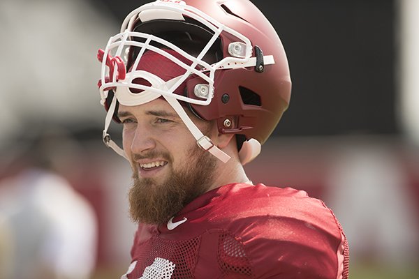 Arkansas tight end Austin Cantrell takes a break during practice Saturday, July 29, 2017, in Fayetteville. 