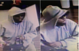 Police are searching for a man accused of robbing an electronics store in Little Rock.