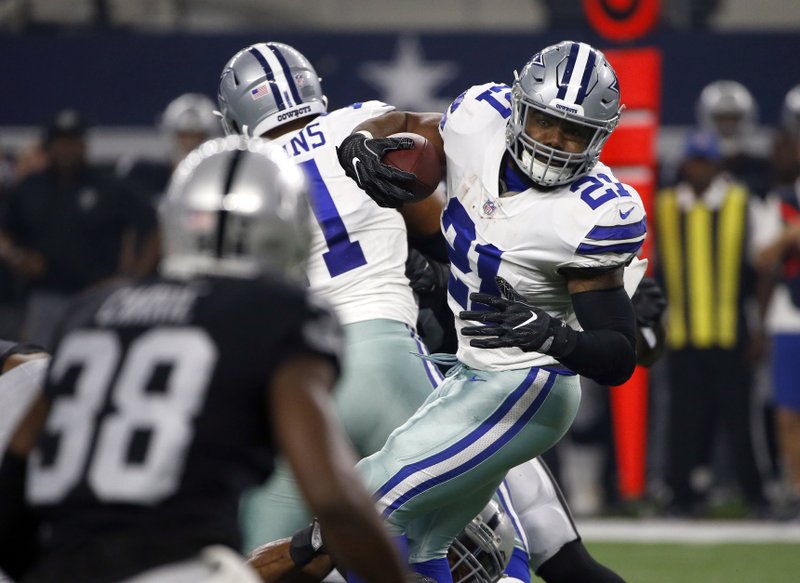 Dallas Cowboys running back Ezekiel Elliott (21) saw his first — and likely his last — action of the 2017 exhibition season, touching the ball 8 times in 10 plays in his only series of the Cowboys’ 24-21 victory over the Oakland Raiders on Saturday night in Arlington, Texas. Elliott is facing a six-game suspension for domestic violence.  
