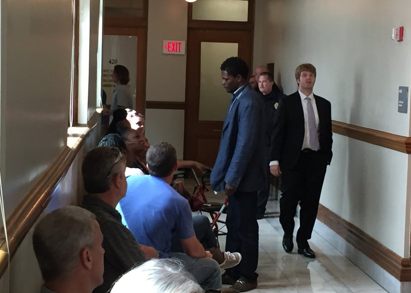 Boxer Jermain Taylor, center, appeared in court Monday Aug. 28, 2017. 