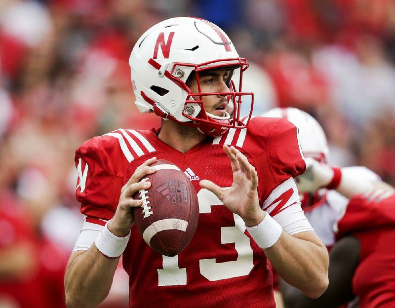 Quarterback Tanner Lee leads a Nebraska offense that will look to replace over 70 percent of its rushing production from last season when the season begins Saturday against Arkansas State in Lincoln, Neb.