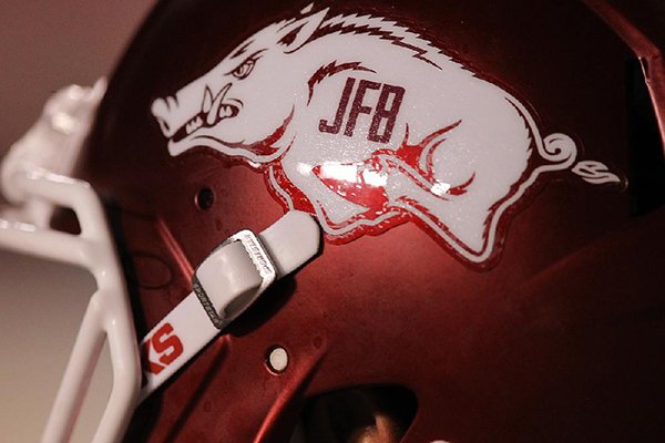 A helmet with the initials of longtime Arkansas coach and athletics director Frank Broyles is shown during a game against Florida A&M on Thursday, Aug. 31, 2017, in Little Rock. 