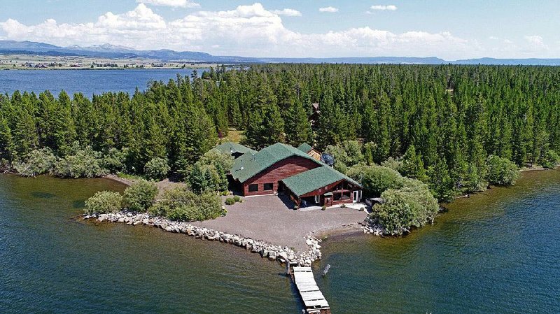 Yellowstone National Park: The 1985 log cabin on Hebgen Lake is listed at $2.45 million.