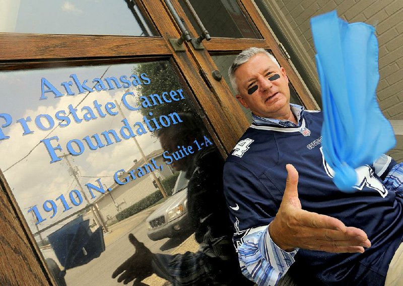 The statewide Blue Ribbon Campaign enlists high school and college football players to wear blue ribbons on their helmets and referees to throw blue penalty !ags during their first games. Survivor John Findlay is an advocate for testing for early detection of prostate cancer.