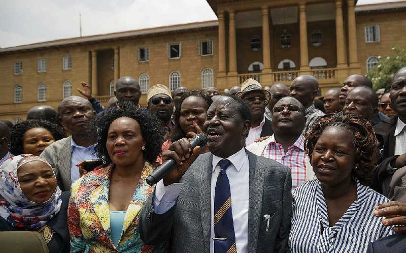 Kenyan opposition leader Raila Odinga addresses supporters in Nairobi after the Supreme Court’s ruling Friday, saying, “It’s a very historic day.” 