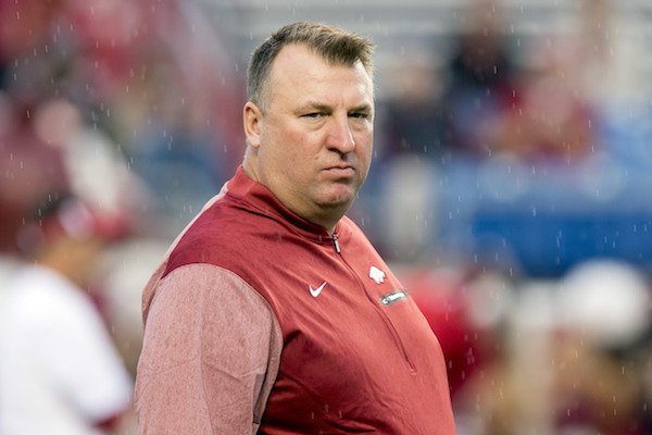 Arkansas head coach Bret Bielema walks across the field before the first quarter of an NCAA college football game against Florida A&M on Thursday, Aug. 31, 2017, in Little Rock, Ark.. (AP Photo/Gareth Patterson)