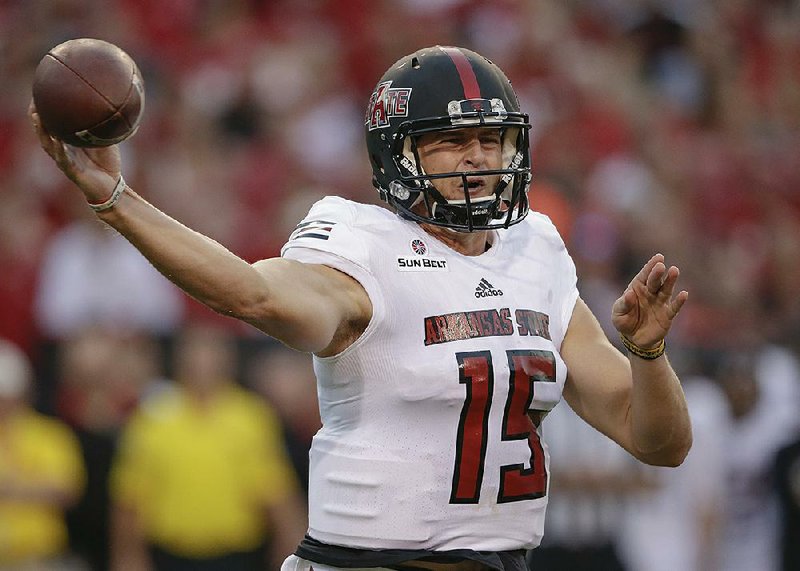 Arkansas State quarterback Justice Hansen (15) completed 46 of 68 passes for 415 yards and 3 touchdowns in a 43-36 loss to Nebraska on Saturday night in Lincoln, Neb.