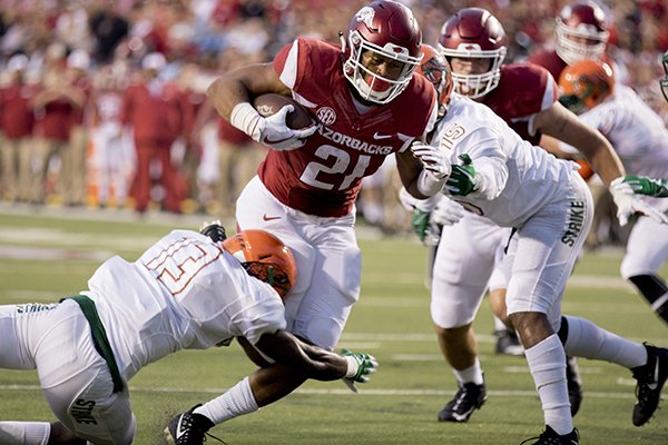 Arkansas running back Devwah Whaley, 21, scores a touchdown during the second quarter of an NCAA college football game against Florida A&M on Thursday, Aug. 31, 2017, in Little Rock, Ark. Arkansas went on to beat Florida A&M 49-7. (AP Photo/Gareth Patterson)

