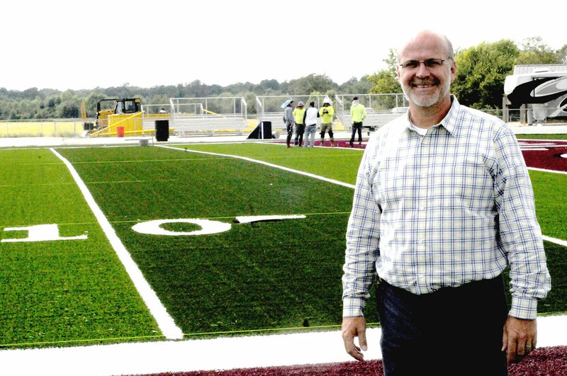 MARK HUMPHREY ENTERPRISE-LEADER Lincoln athletic director Deon Birkes spearheaded an effort to install artificial turf at Wolfpack Stadium. The work began in July and was completed this week. A dedication ceremony will be held at halftime of Lincoln&#8217;s home game Friday against Keys, Okla. A pre-game tailgate party and post-game fireworks show are also part of the celebration. The community is invited to join in and come out and support the Wolves.