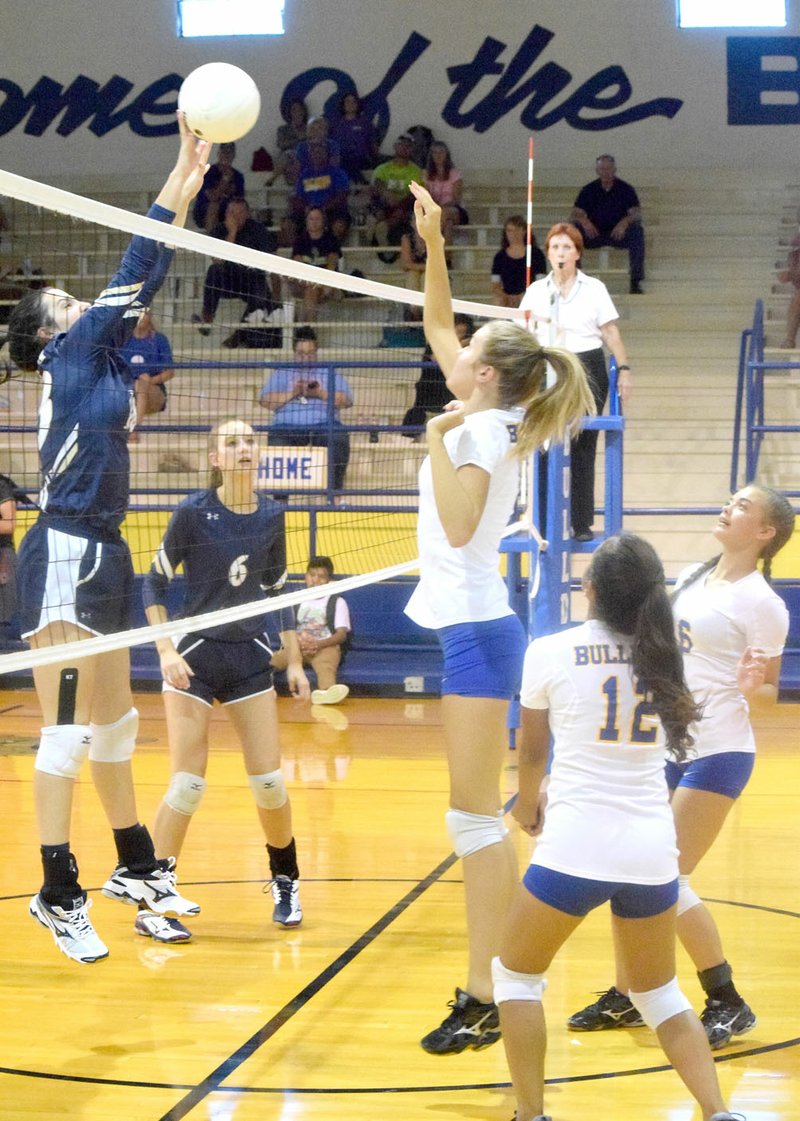 Photo by Mike Eckels Shiloh Christian&#8217;s Shea Sandefur (far left) contacts the ball, returning it to the Decatur side where Talor Thompson (8) goes up to intercept during the Decatur-Shiloh Christian conference volleyball match at Peterson Gym in Decatur Aug. 29. With the help of Destiny Meija (16, right) and Kaylee Morales (12), Thompson was able to return it to Shiloh&#8217;s Kaylee Jackson (6).