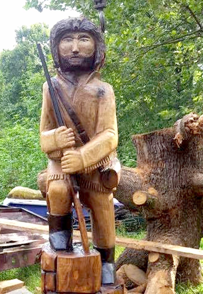 Submitted Photo What was once the old &quot;Smoking Tree&quot; was saved from demolition and transformed into &quot;Ole Smokey,&quot; a replica of the Gentry Pioneer mascot. The chainsaw sculpture will soon be displayed on the high school campus.