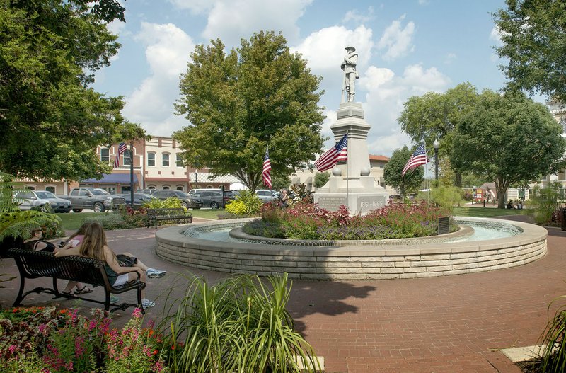 Photo by Ben Goff A Confederate monument stands Sunday on the Bentonville square.