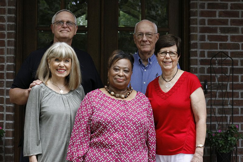 In the front row, from left, Eva Rose, Obera Norman and Ann Walker; and back row, Jim Rose and Jay Walker, all members of Logos One by One Inc., stand outside of The River House Bed-and-Breakfast in Searcy. The Roses recently opened the bed-and-breakfast to help with ministry expenses for the nonprofit organization.