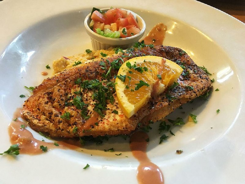 The former Garden Bistro on North Hills Boulevard in North Little Rock is now The Lakewood Lounge, serving predominantly seafood — including grilled red snapper. 