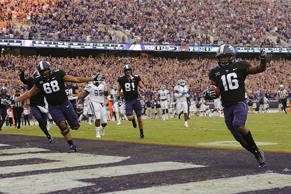 TCU running back Kenedy Snell (16) scores on a 13 yard pass in the first quarter against Jackson State during an NCAA college football game in Fort Worth, Texas, Saturday, Sept. 2, 2017. (Rodger Mallison/Star-Telegram via AP)

