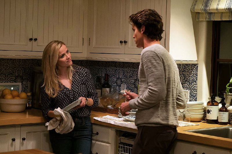 Alice (Reese Witherspoon) gets her groove back, in part thanks to a fling with young director Harry (Pico Alexander) in Hallie Meyers-Shyer’s romantic comedy Home Again.