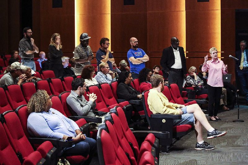 People line up to ask questions of a panel during a “Crime in Little Rock: A Dialogue” event at the Ron Robinson Theater on Thursday.