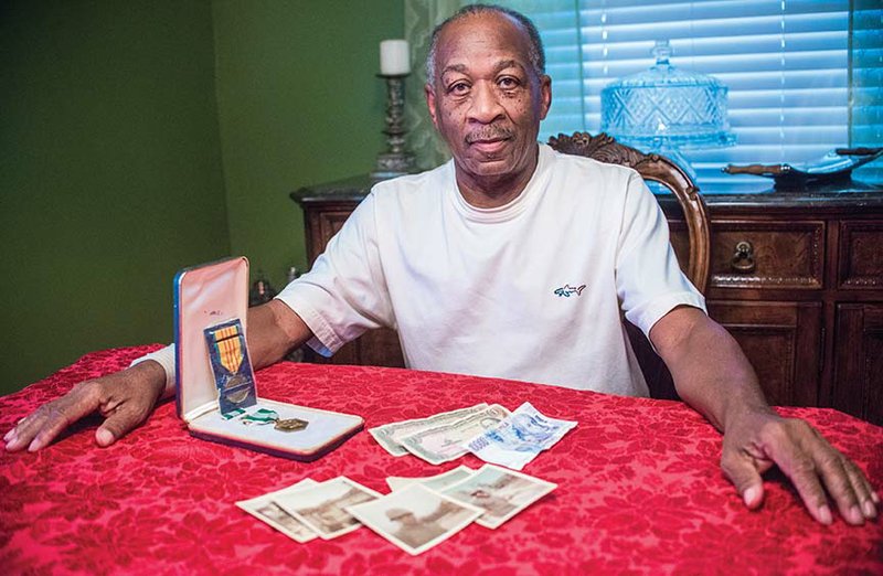Carl Edward Hampton Sr. served two years in the U.S. Army during the Vietnam War. His military service includes one year in Vietnam, where he worked in communications, plotting the movement of troops in and around Duc Pho. He keeps some of his medals and Vietnam currency in a footlocker at his home in Morrilton.
