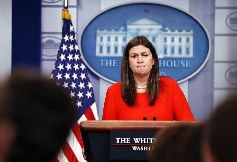 White House Press Secretary Sarah Huckabee Sanders pauses while reading President Trump’s list of egregious purveyors of “fake news.” Fayetteville-born Otus the Head Cat’s award-winning column of humorous fabrication appears every Saturday.
