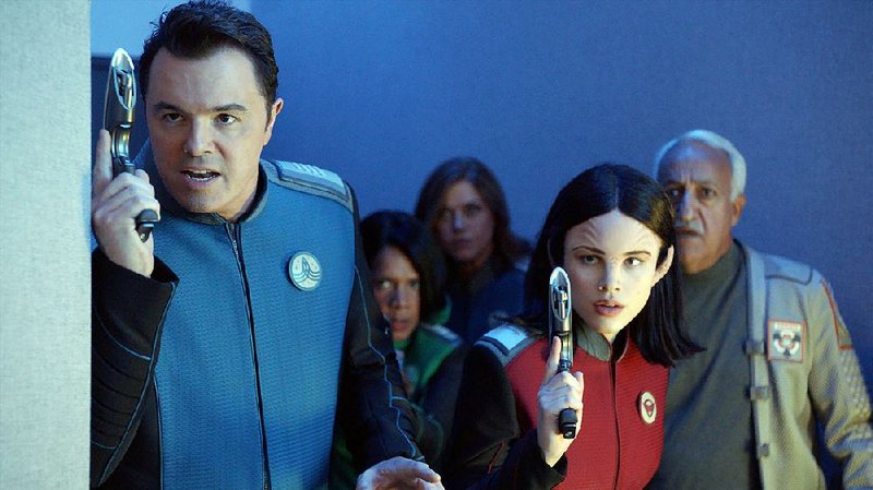The Orville, a space comedy/drama from Fox, stars (from left) creator Seth MacFarlane, Penny Johnson Jerald, Adrianne Palicki, Halston Sage and guest star Brian George. Part 1 debuts at 7 p.m. today following football.
