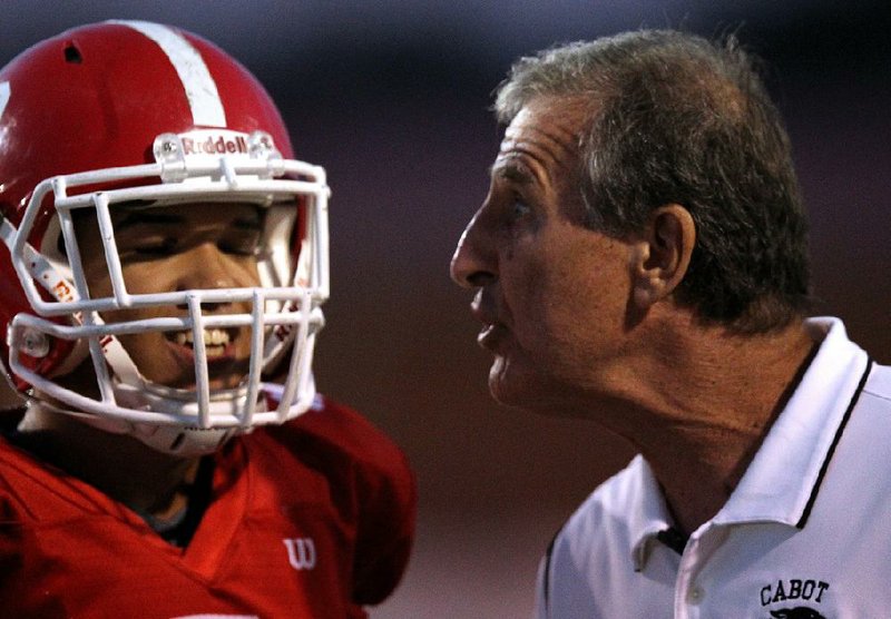 Arkansas Democrat-Gazette/THOMAS METTHE -- 9/8/2017--
Cabot head coach Mike Malham talks with quarterback Tommy Oaks (2) during the second quarter on Friday, Sept. 8, 2017, at Panther Stadium in Cabot. 