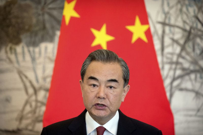 Chinese Foreign Minister Wang Yi speaks during a joint press conference at the Diaoyutai State Guesthouse in Beijing, Friday, Sept. 8, 2017. (AP Photo/Mark Schiefelbein)