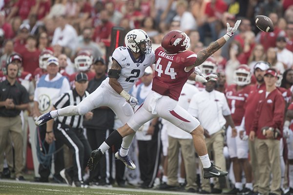 Arkansas tight end Austin Cantrell (44) reaches for an overthrown pass during a game against TCU on Saturday, Sept. 9, 2017, in Fayetteville. 