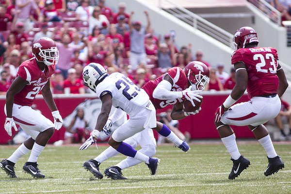 TCU Horned Frogs vs Arkansas Razorbacks â€“ Santos Ramirez (9) of the Razorbacks intercepts the ball from the Horned Frogs at Donald W. Reynolds Razorback Stadium, University of Arkansas, Fayetteville, AR, on Saturday, September 9, 2017.