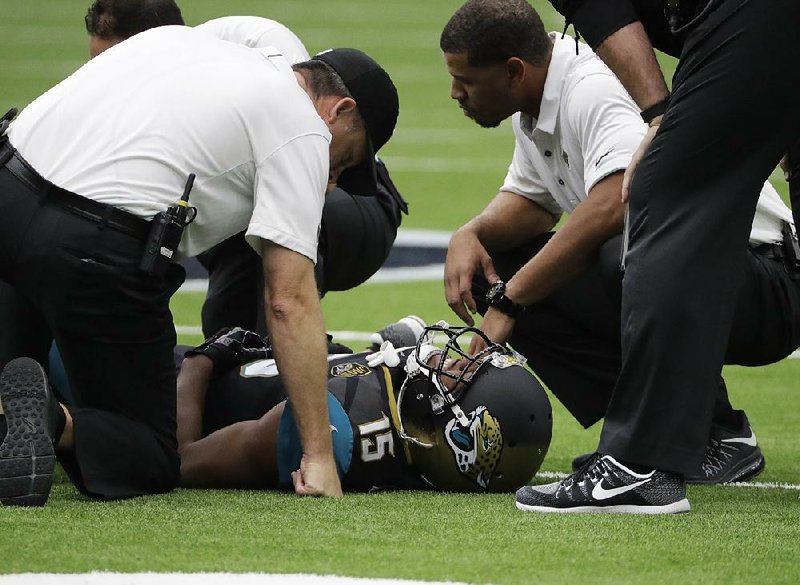 Jacksonville Jaguars wide receiver Allen Robinson (15) suffered a season-ending knee injury against the Houston Texans during the first half of Sunday’s game in Houston.