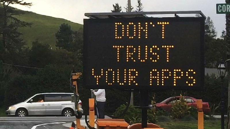 This undated photo provided by the City of Fremont, Calif., shows a blinking sign warning drivers: “Don’t Trust Your Apps” when navigating around the city’s more congested streets.