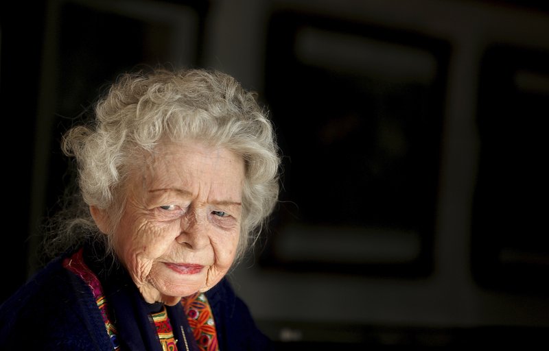 In this Tuesday, Dec. 9, 2014 file photo, Nancy Hatch Dupree listens during an interview with The Associated Press at the Afghanistan Center at Kabul University. 